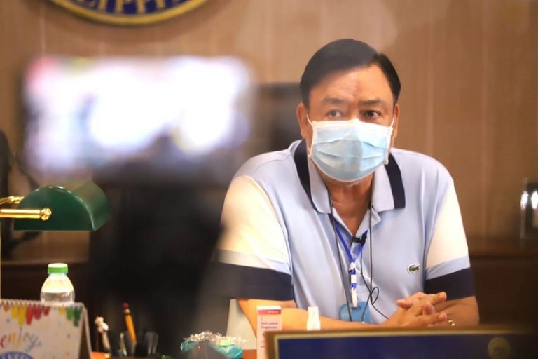 mayor trenas with surgical mask.jpg