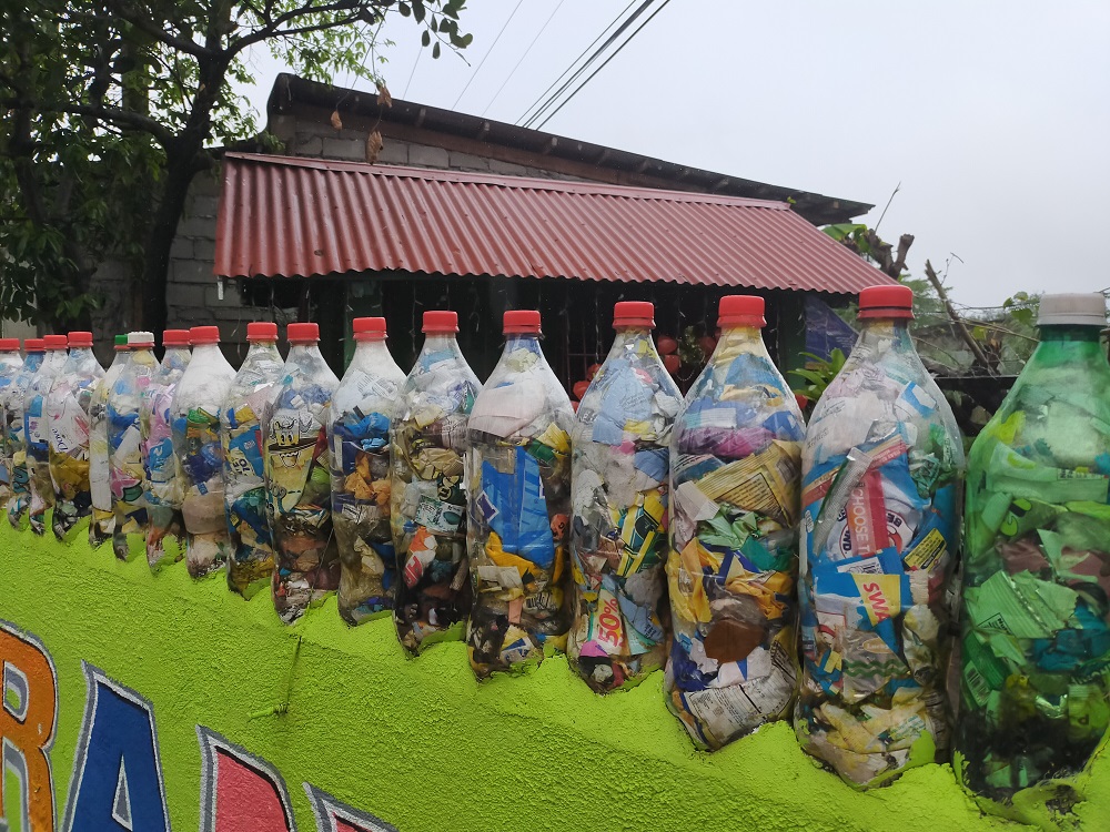 Plastic bottles recycled as trash containers.jpg