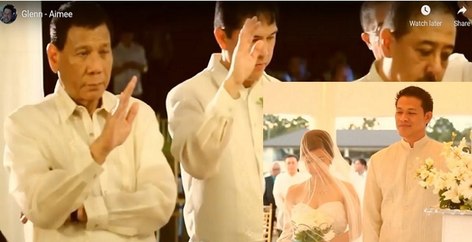 Pres. Duterte, as principal ninong, gives his blessings to newlywed Aimee Torrefranca and Neri in 2012.jpg