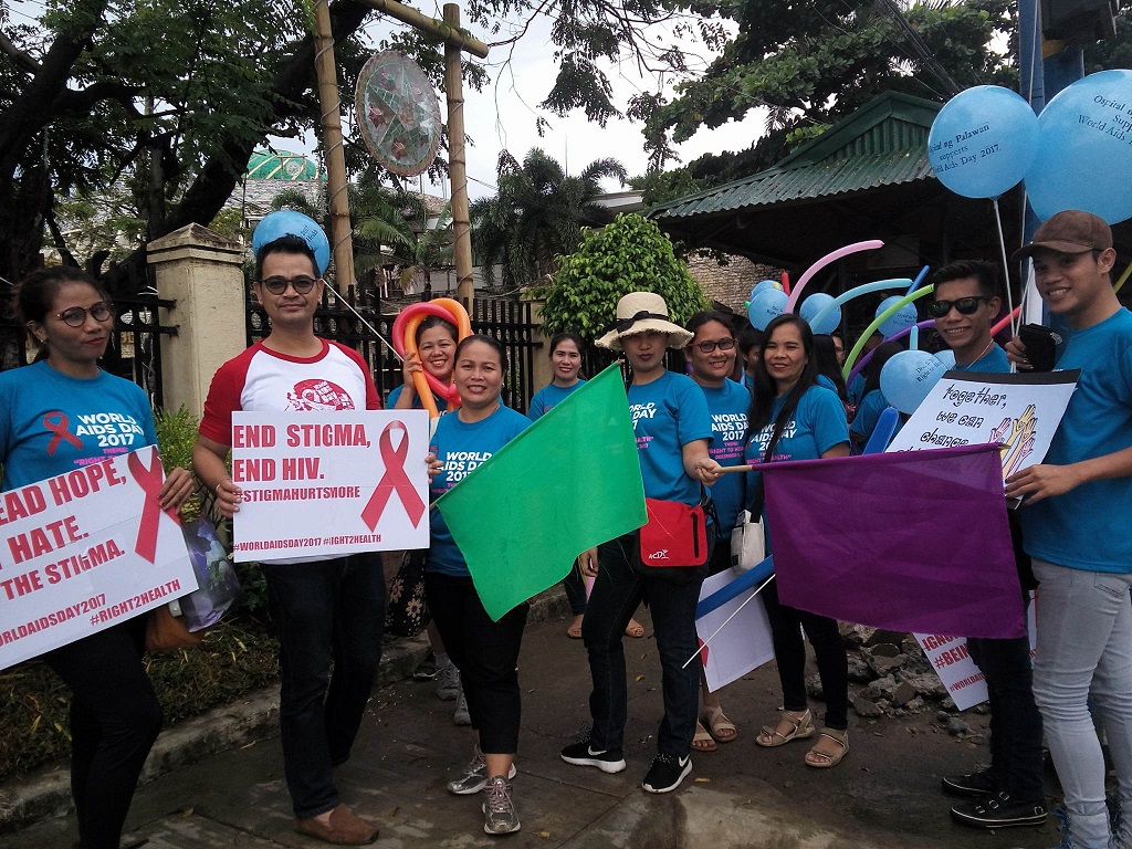 Dr. Ocampo (in red and white shirt) with Palwan HIV  advocates.jpg
