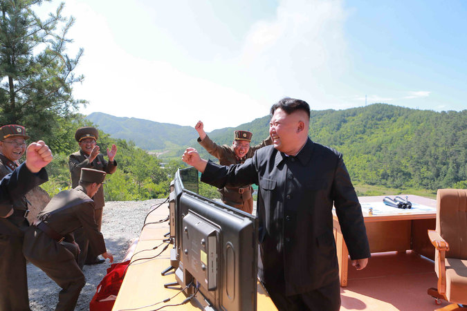 A photograph released by the North Korean news agency showing Kim Jong-un reacting after the launch. Credit KCNA, via Reuters.jpg